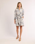 Woman wearing a floral dress on a white background
