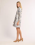 Woman wearing a floral dress on a white background