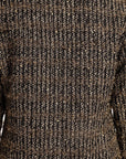 Close-up of a textured brown and black patterned fabric