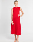 Woman wearing a red dress on a white background