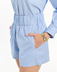 Light blue and white striped set on a white background