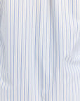 Close-up of a white fabric with blue vertical stripes