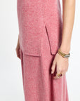 Close-up of a pink dress with a white background