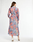 Woman wearing a floral dress on a white background
