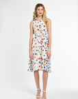 Woman wearing a floral dress on a white background