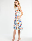 Woman wearing a floral dress on a white background