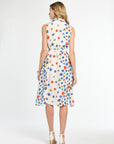 Woman wearing a floral dress on a white background