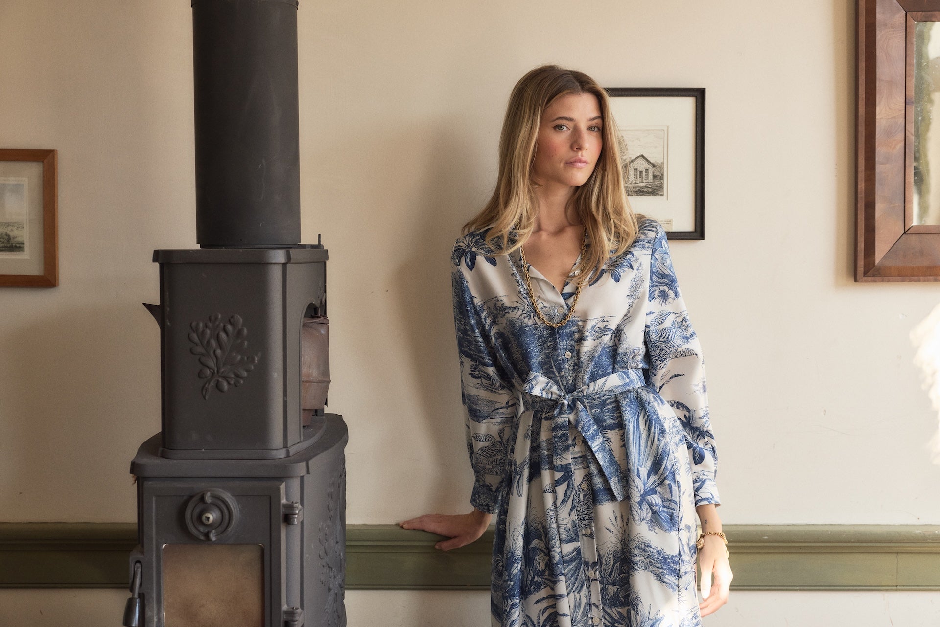 Woman posing in Navy Palm Toile Eleanor Dress.