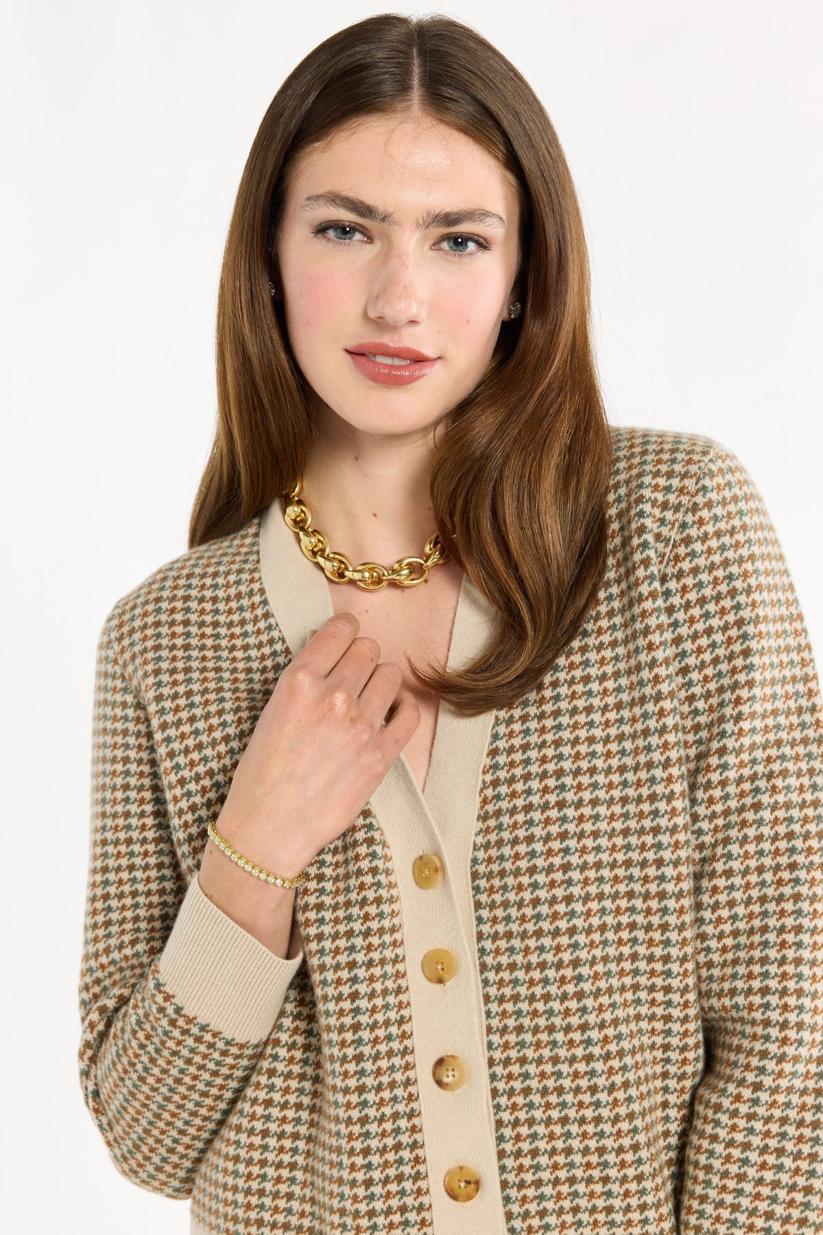 A woman modeling the Camel Tri-Color Check Classic Cashmere Cardigan with camel trousers, mid-length front view, photographed against a plain white studio background.