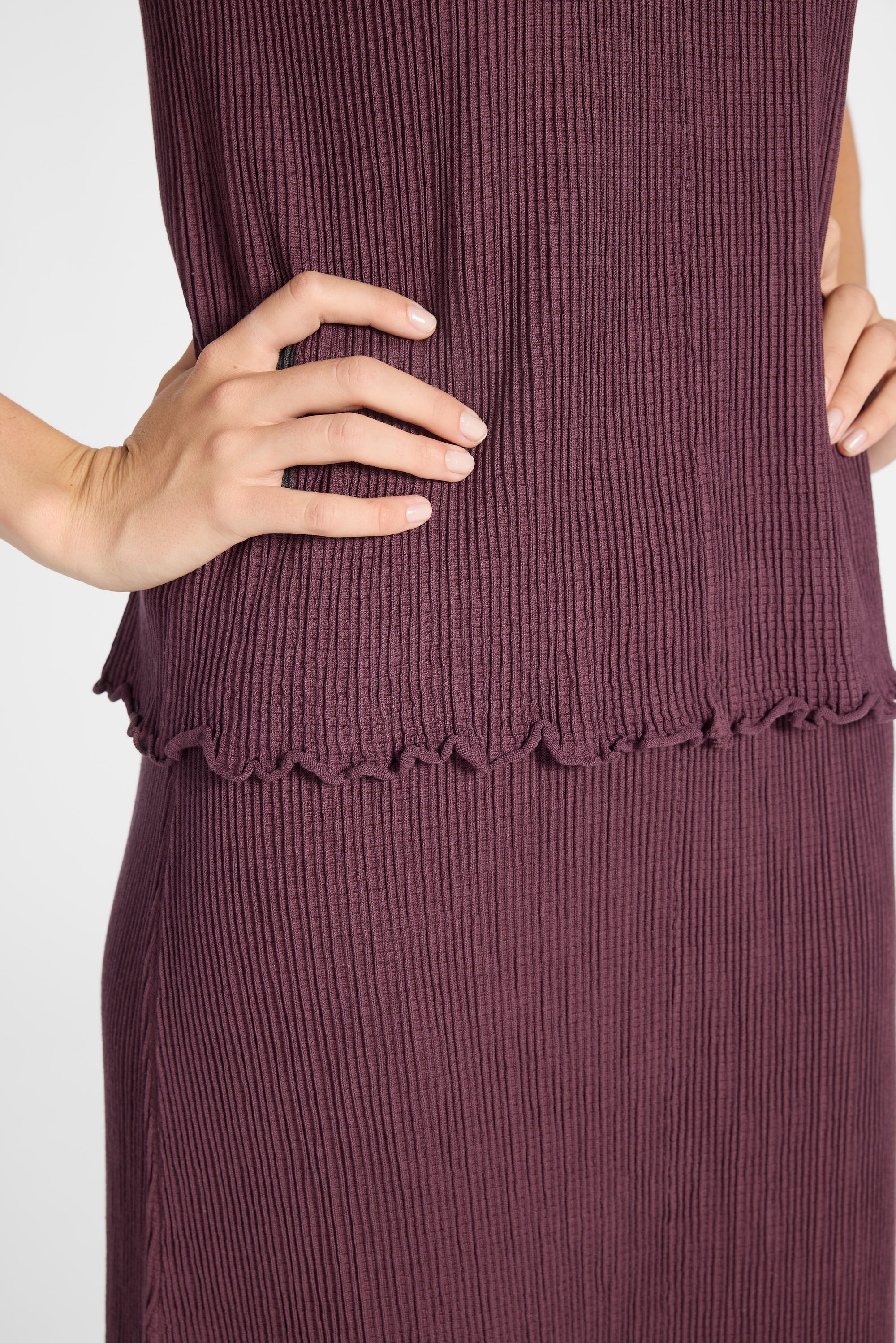 Close up photo of pleated purple silk fabric
