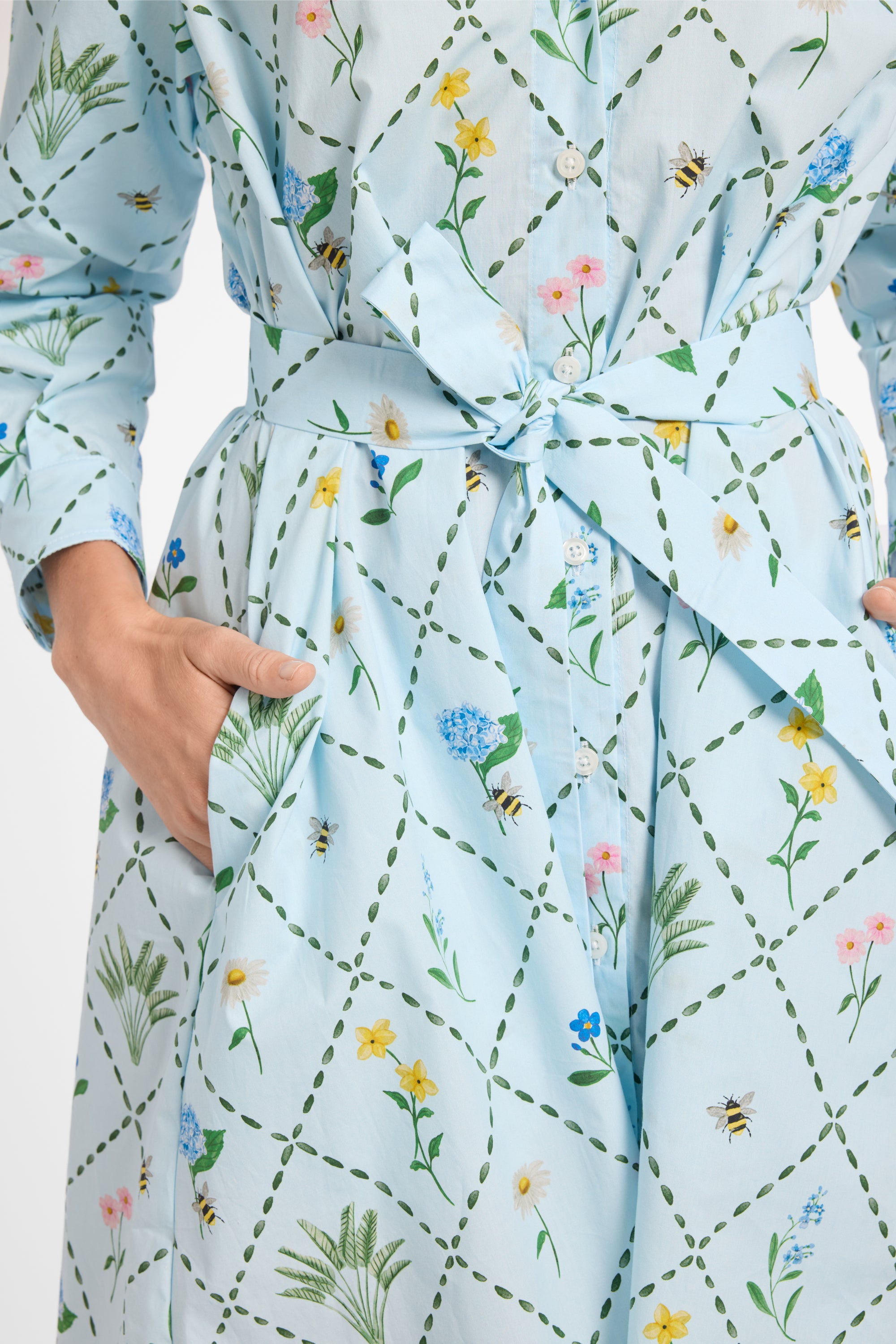 Floral patterned dress with a white background