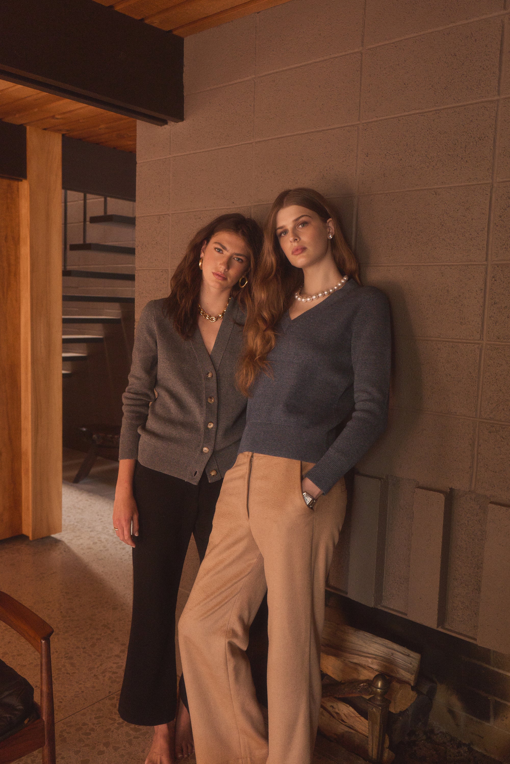 Women in a basement modeling cotton tops 