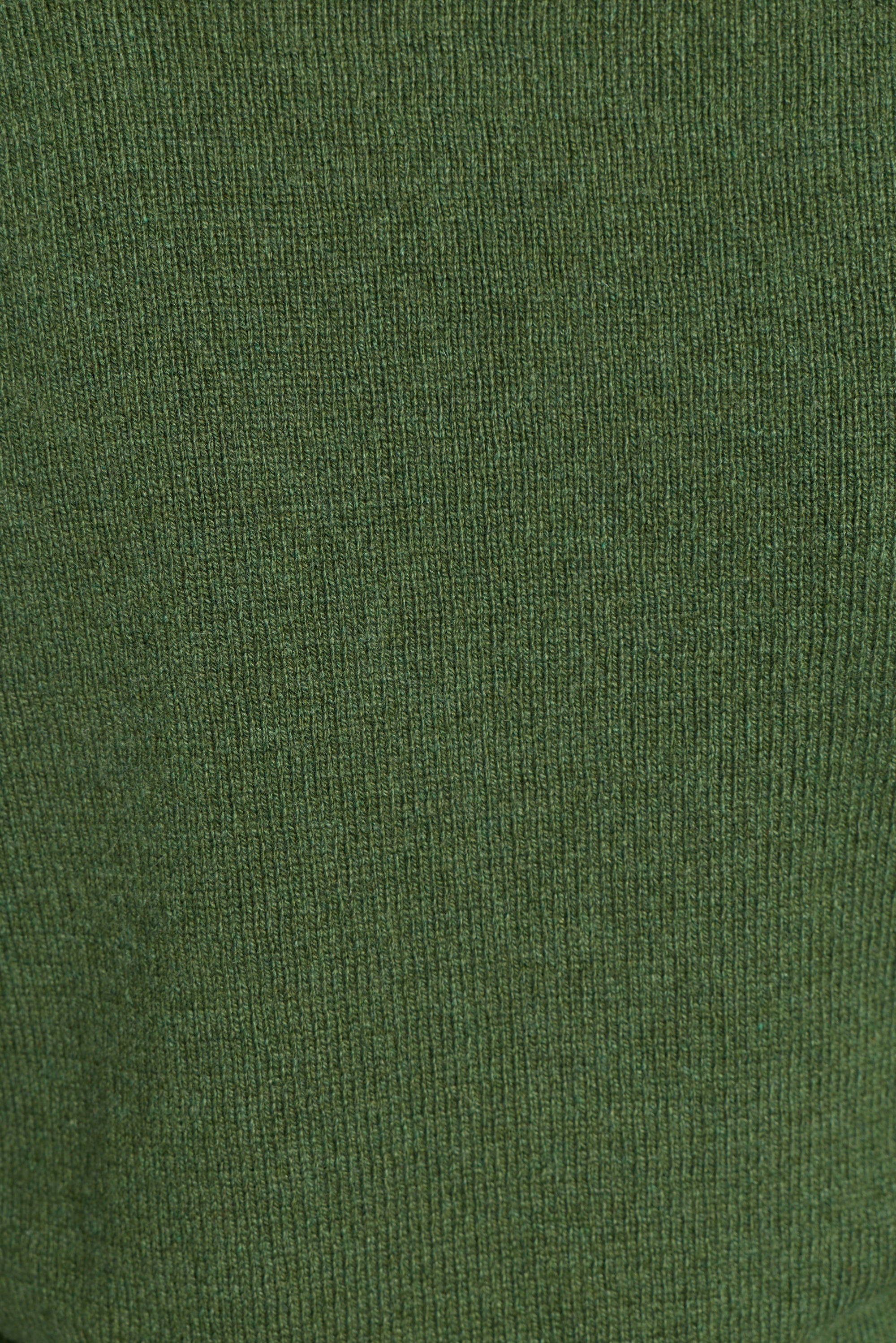 A close-up of a dark olive green ribbed knit fabric texture.