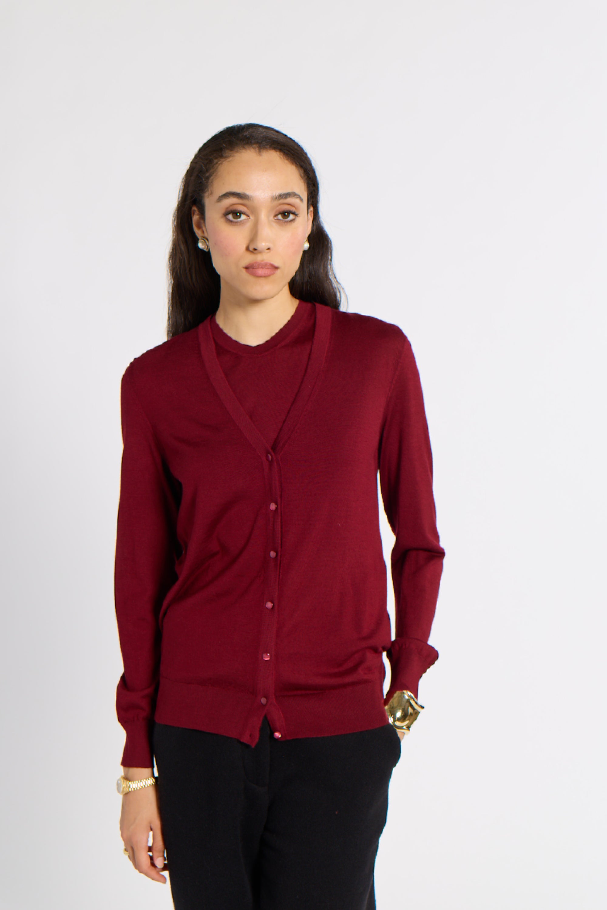 Woman modeling a red tissue cashmere cardigan