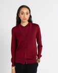 Woman modeling a red tissue cashmere cardigan
