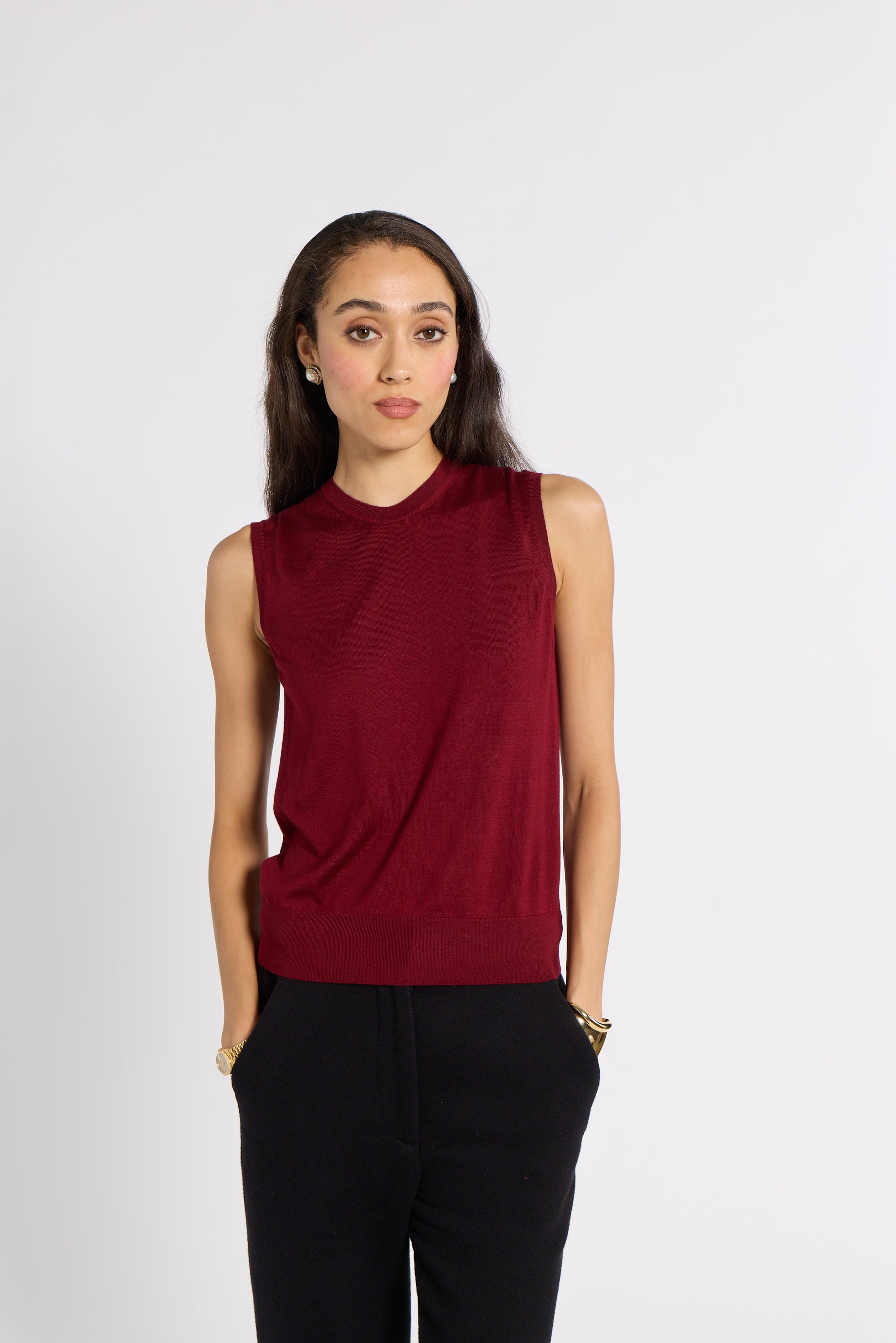 Woman wearing red tissue shell