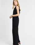 Woman wearing a black lace pants on a white background