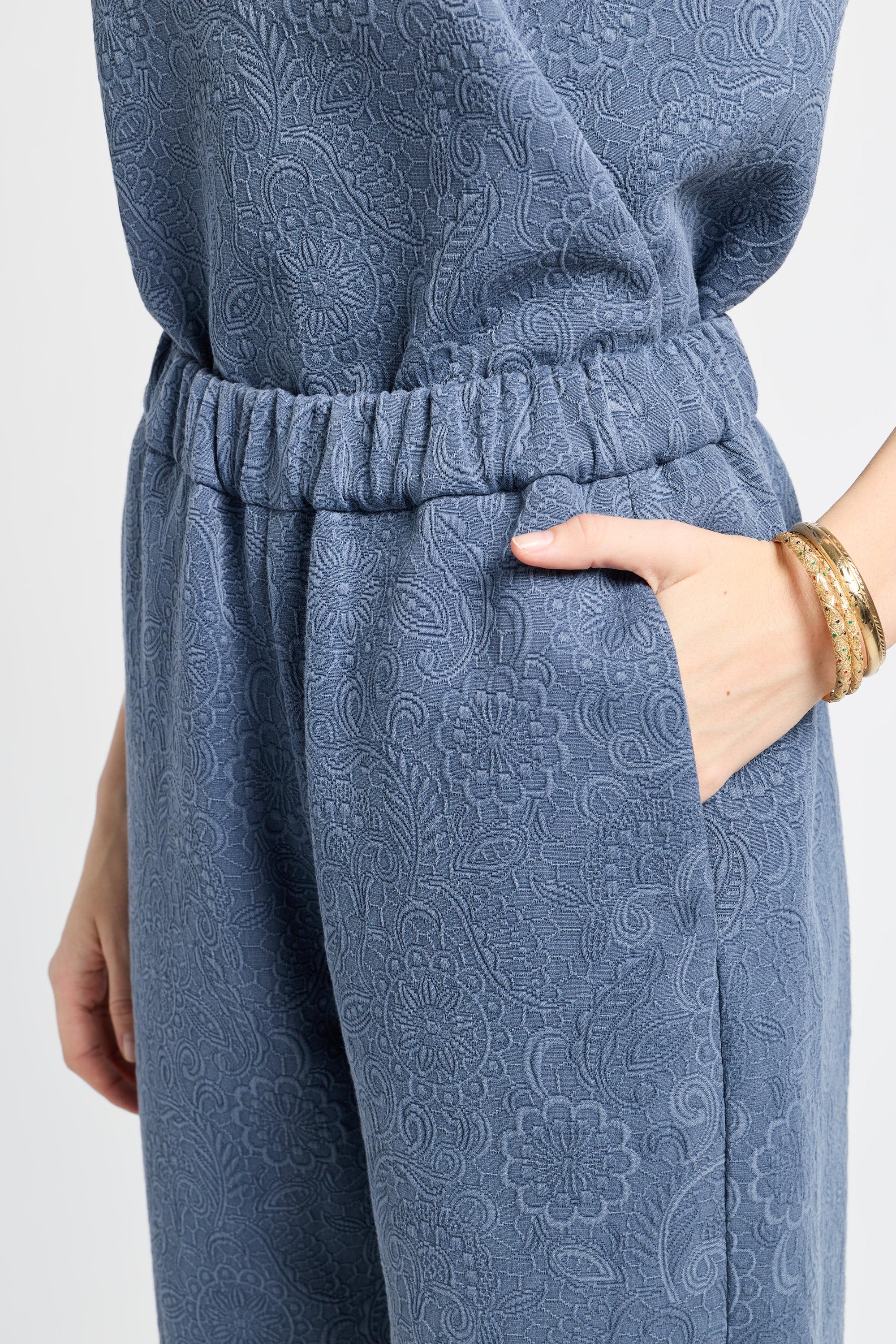 Image of blue patterned pants with a white background