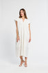 Woman wearing a white dress on a white background