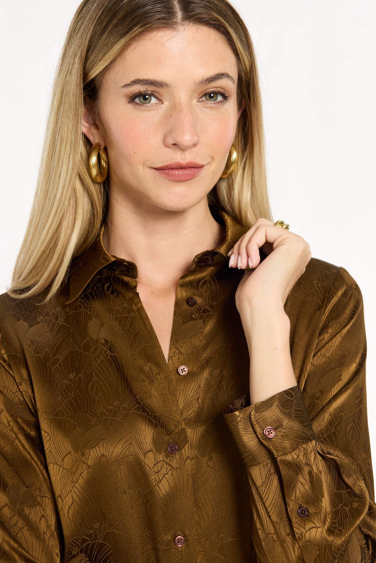 Close-up of the pointed collar, buttons, and tonal floral texture of the Golden Umber Eleanor Shirt, photographed against a plain white studio background.