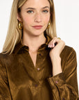 Close-up of the pointed collar, buttons, and tonal floral texture of the Golden Umber Eleanor Shirt, photographed against a plain white studio background.
