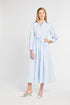 Woman with blue stripe dress with white background.