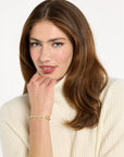 woman wearing cream baby cashmere turtleneck