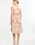 Woman wearing a floral dress on a white background