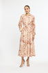 Woman wearing a floral dress on a white background