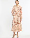 Woman wearing a floral dress on a white background
