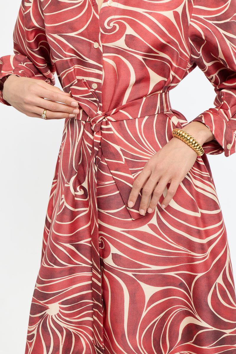 Red and white patterned dress with a white background