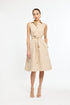 Woman wearing a beige striped dress on a white background