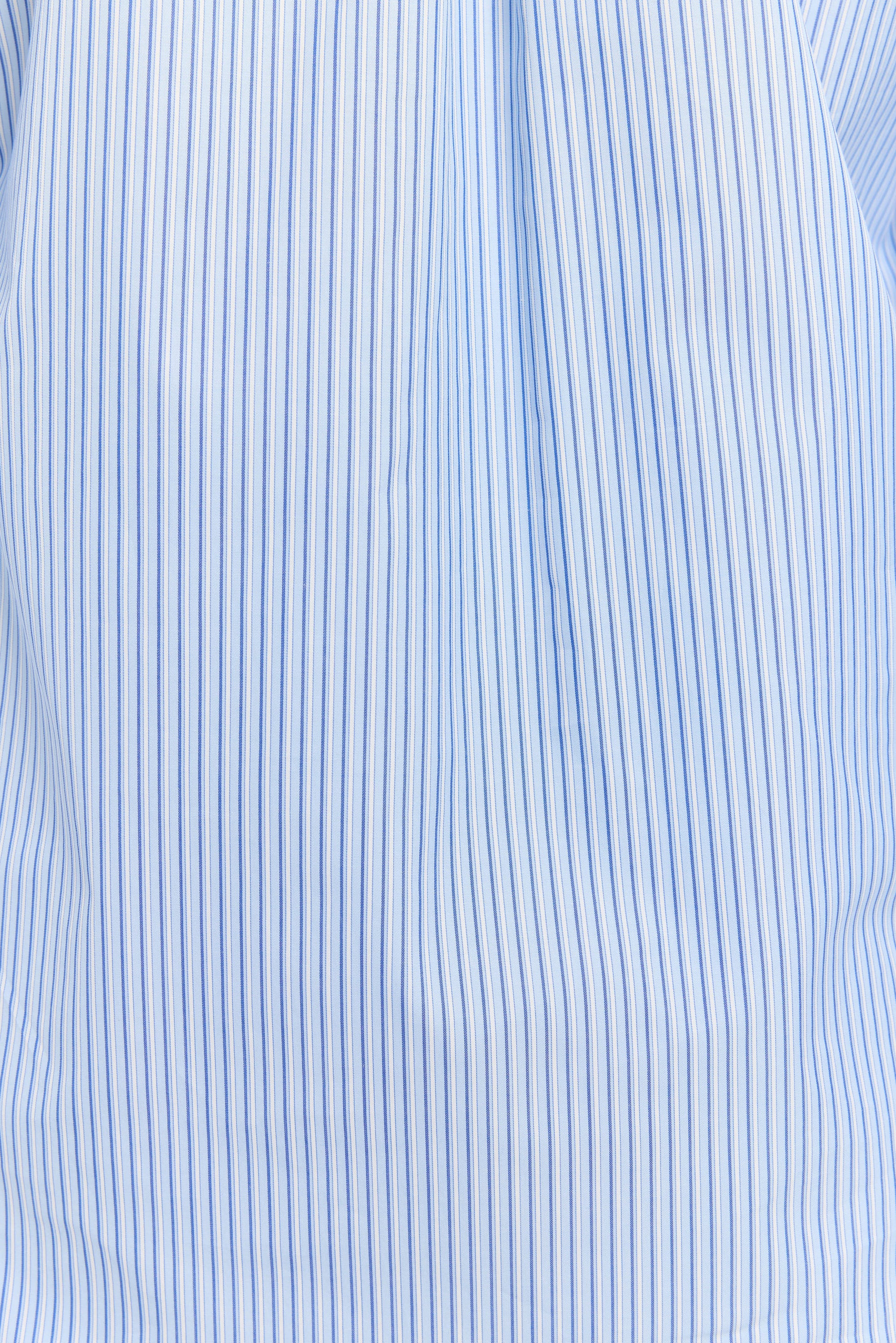 Close-up of a blue and white striped fabric texture