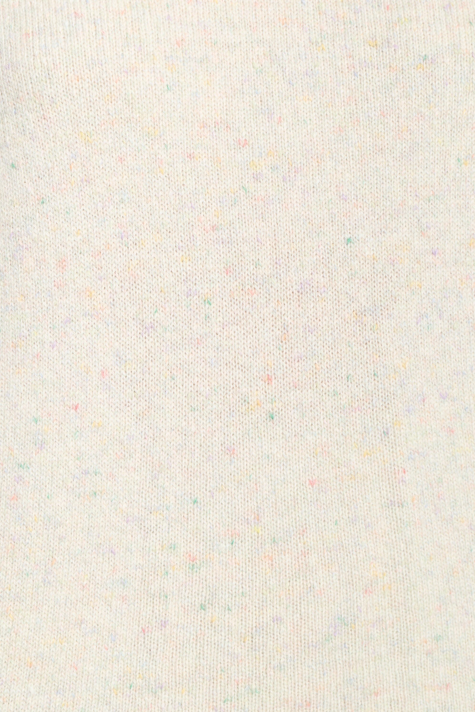 swatch showing the yarn beige with colorful flecks