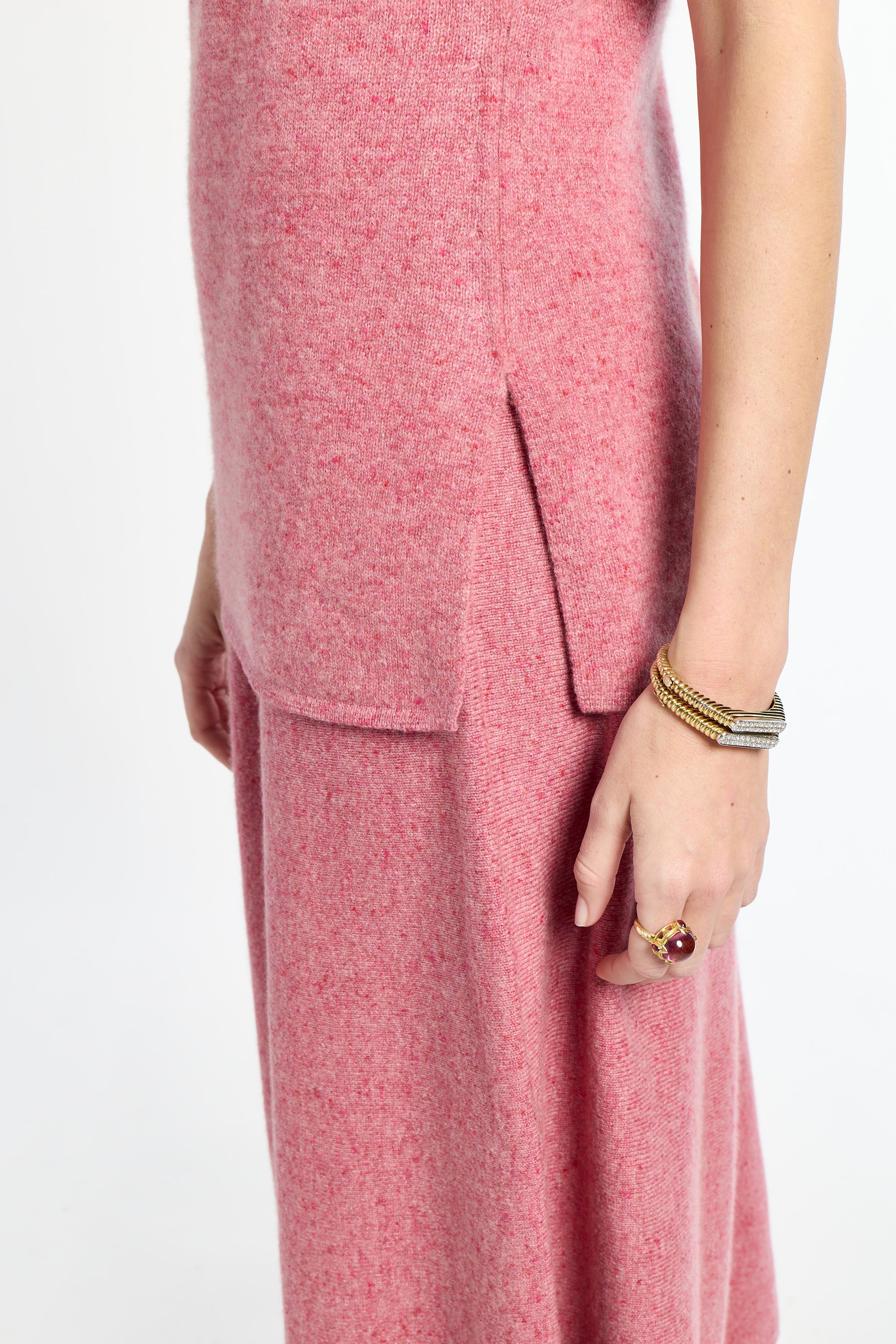 Close-up of a pink dress with a white background