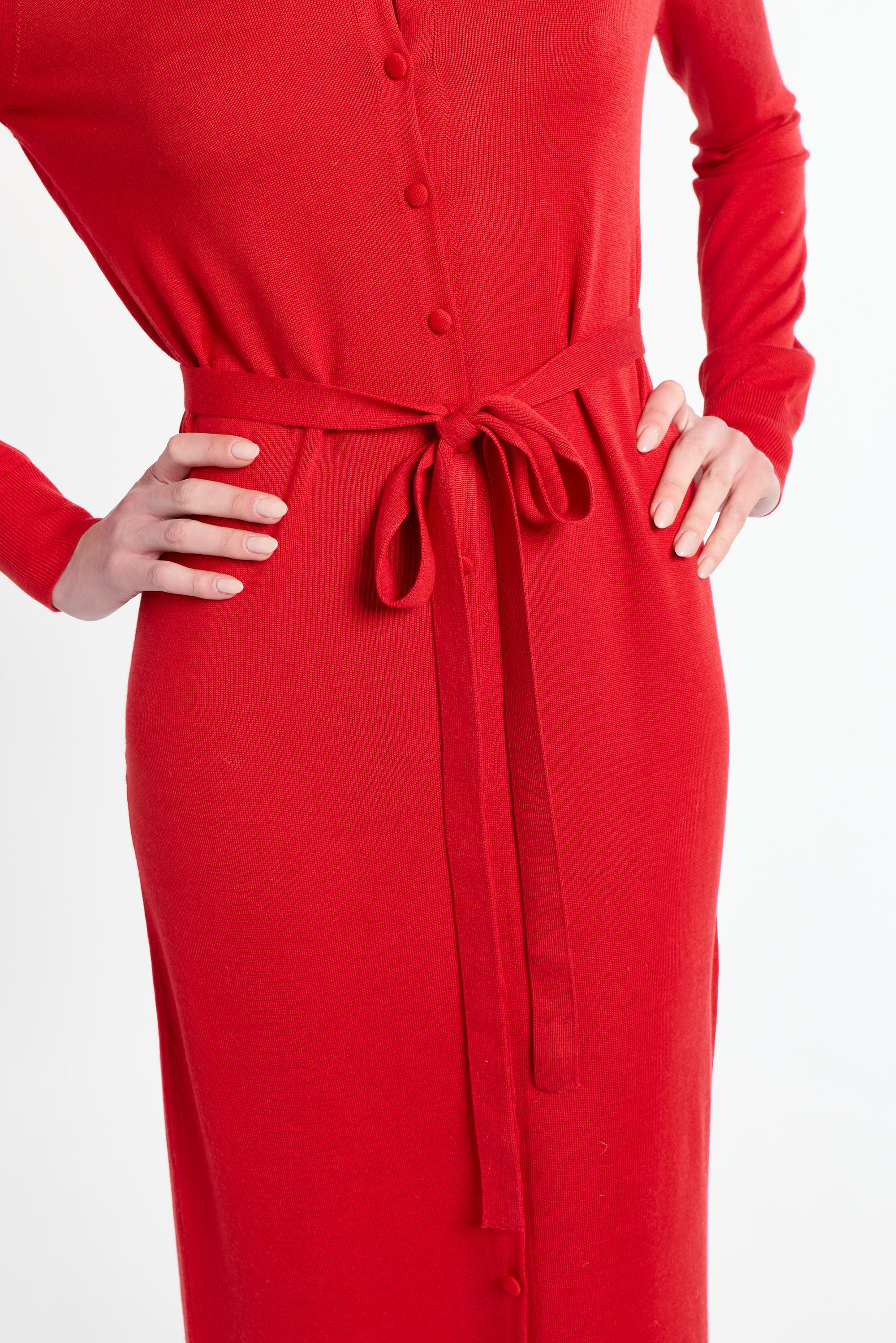 Red dress with a belt on a white background