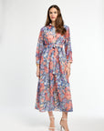 Woman wearing a floral dress on a white background