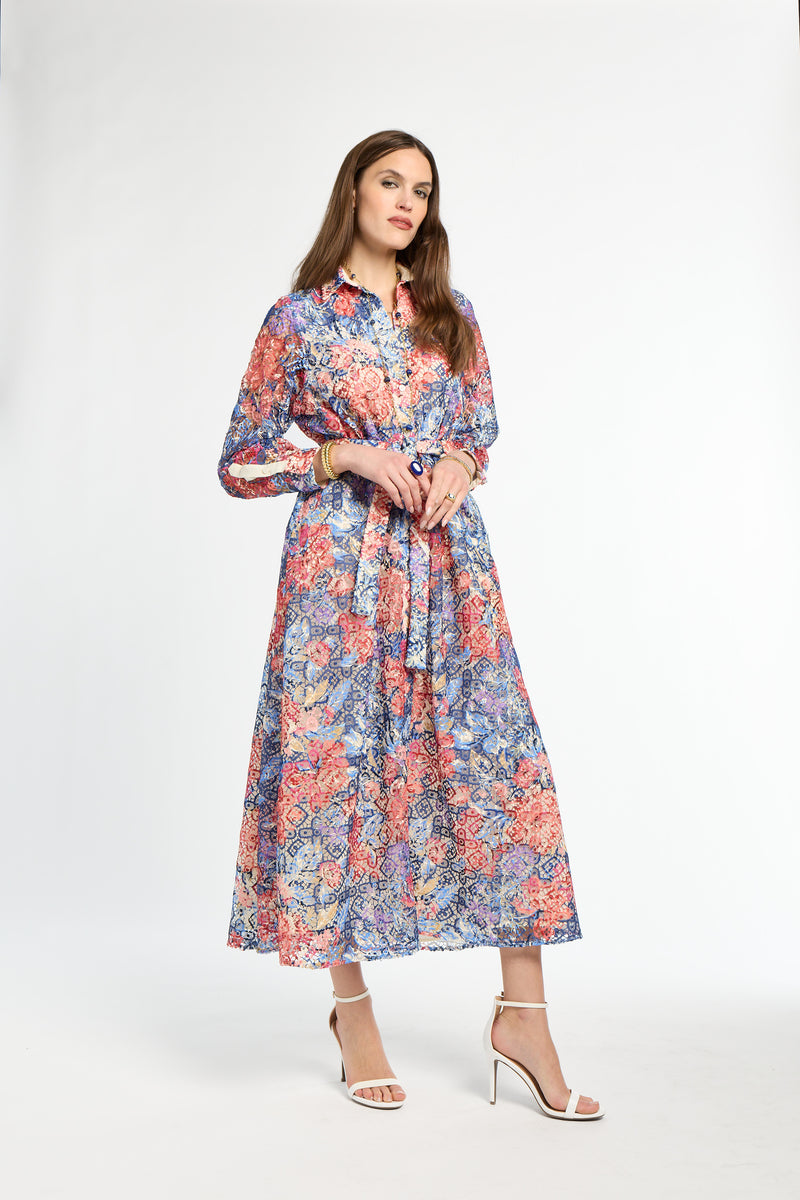 Woman wearing a floral dress on a white background