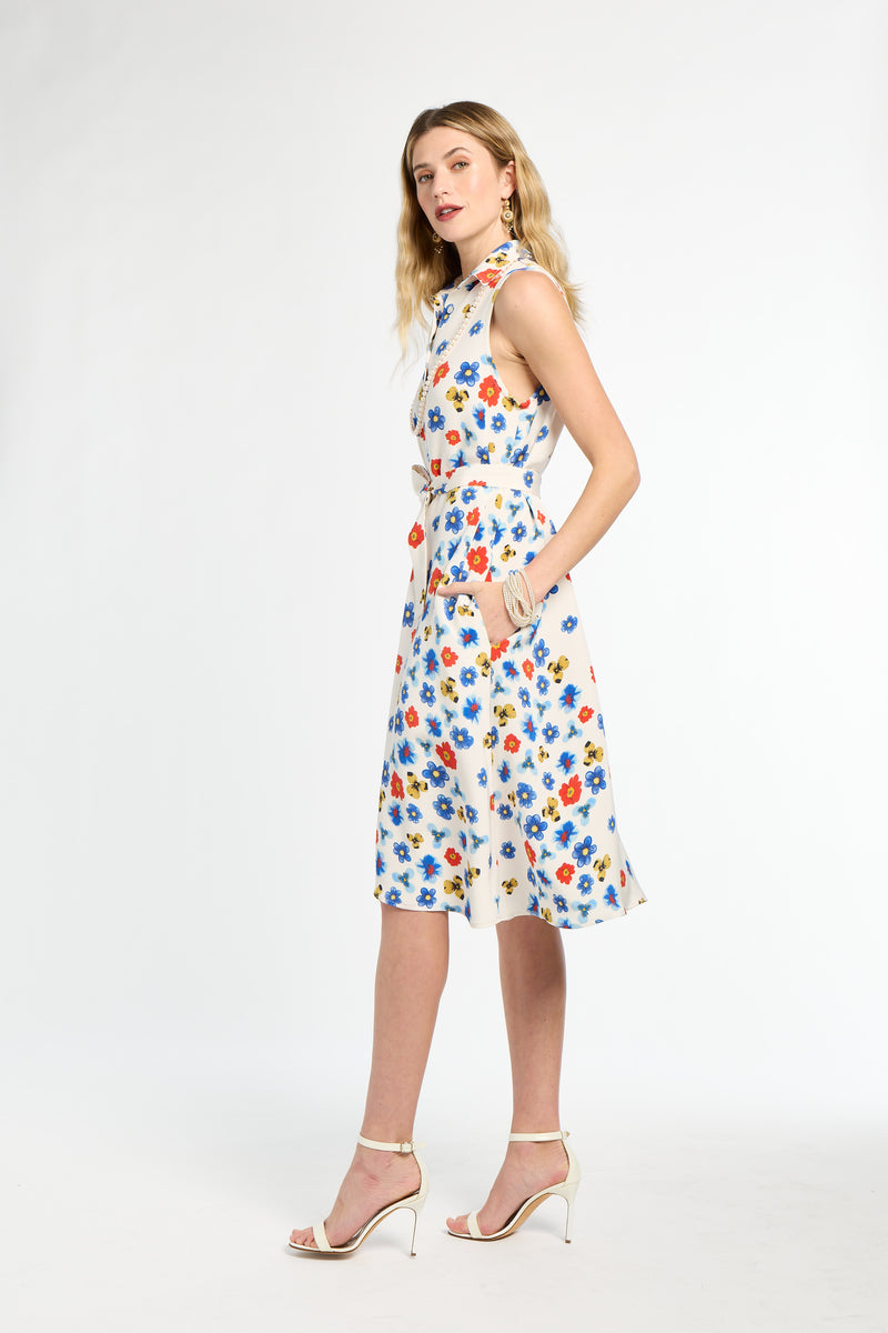 Woman wearing a floral dress on a white background