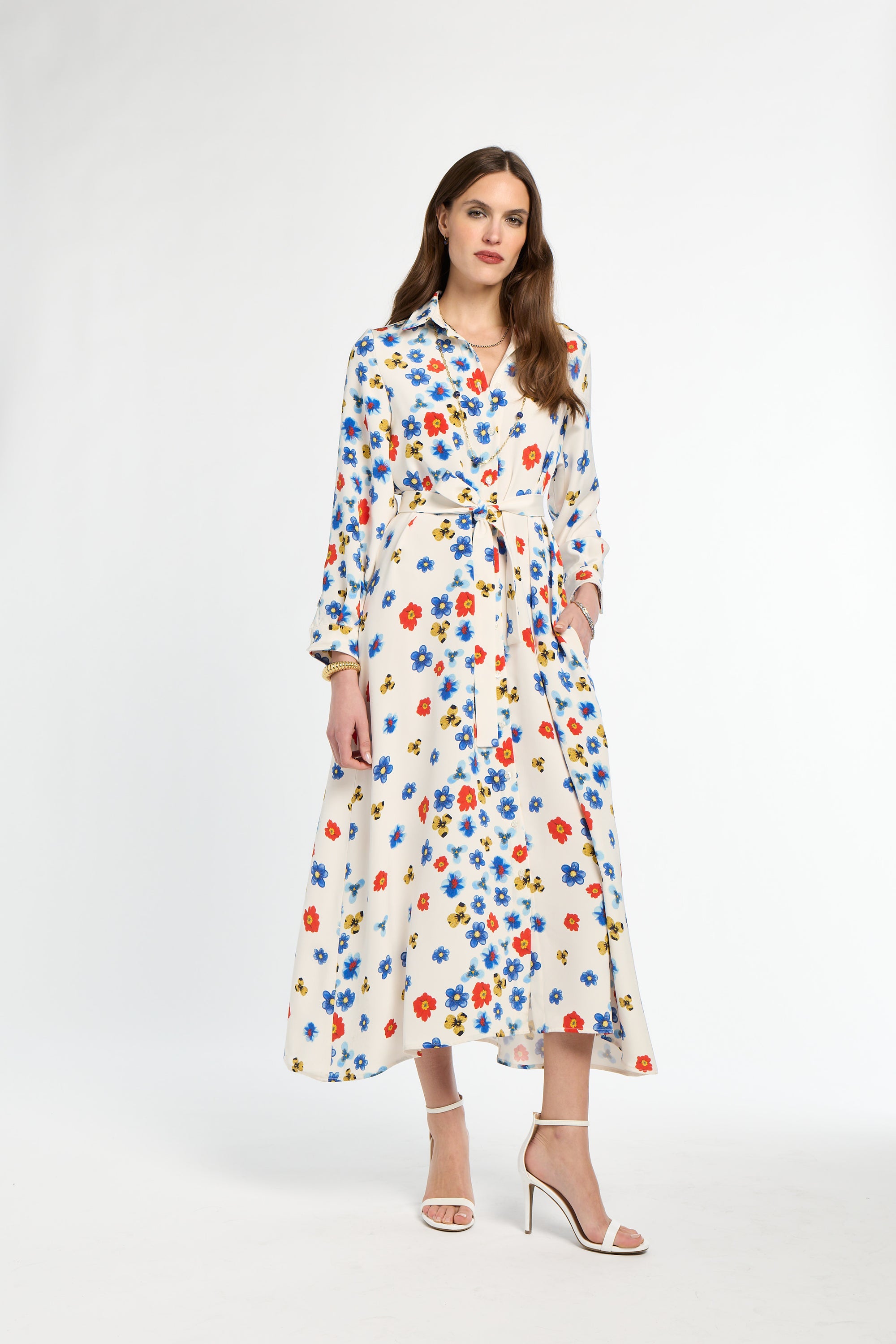 Woman wearing a floral dress on a white background