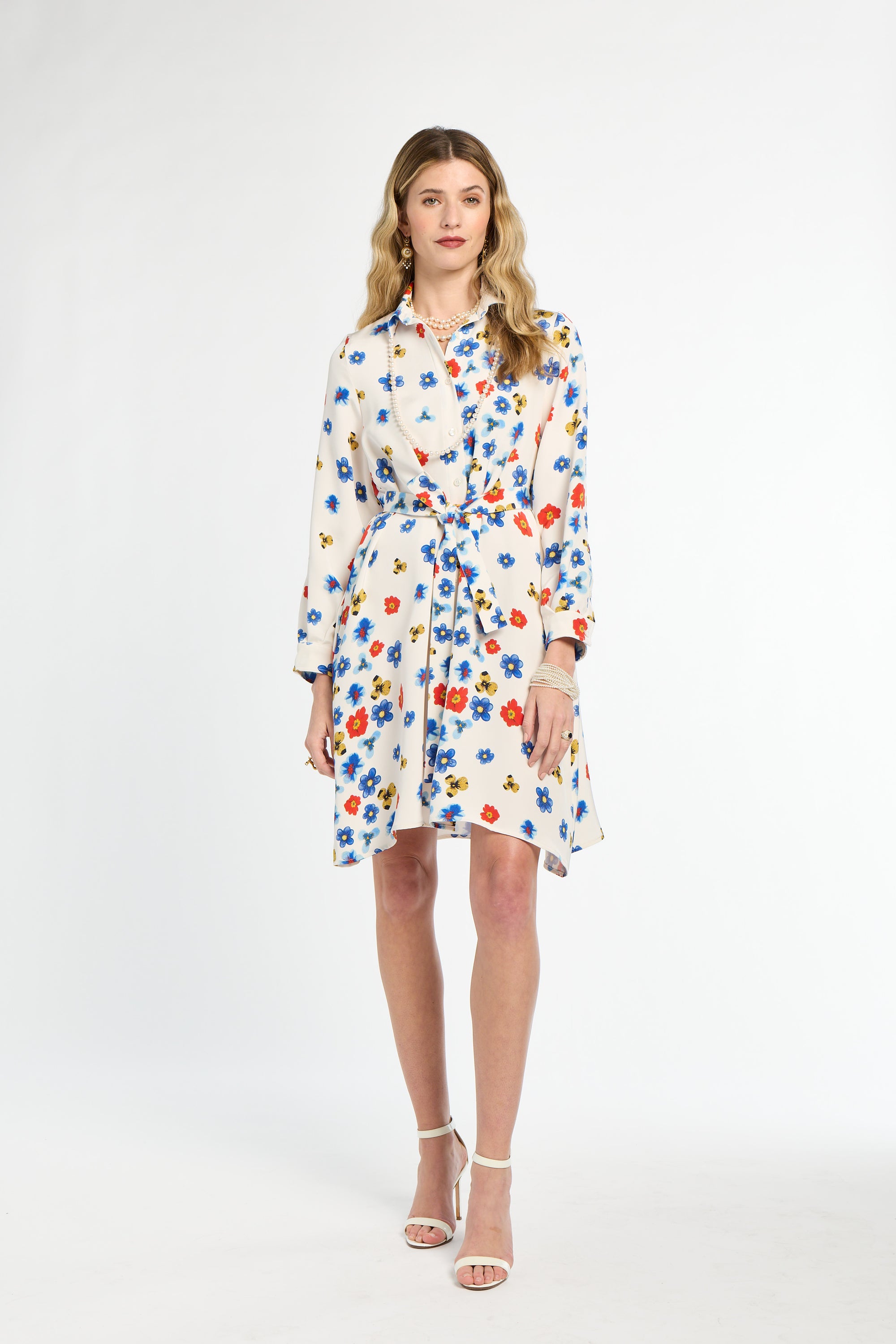 Woman wearing a floral dress on a white background