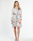 Woman wearing a floral dress on a white background