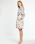 Woman wearing a floral dress on a white background