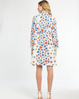 Woman wearing a floral dress on a white background
