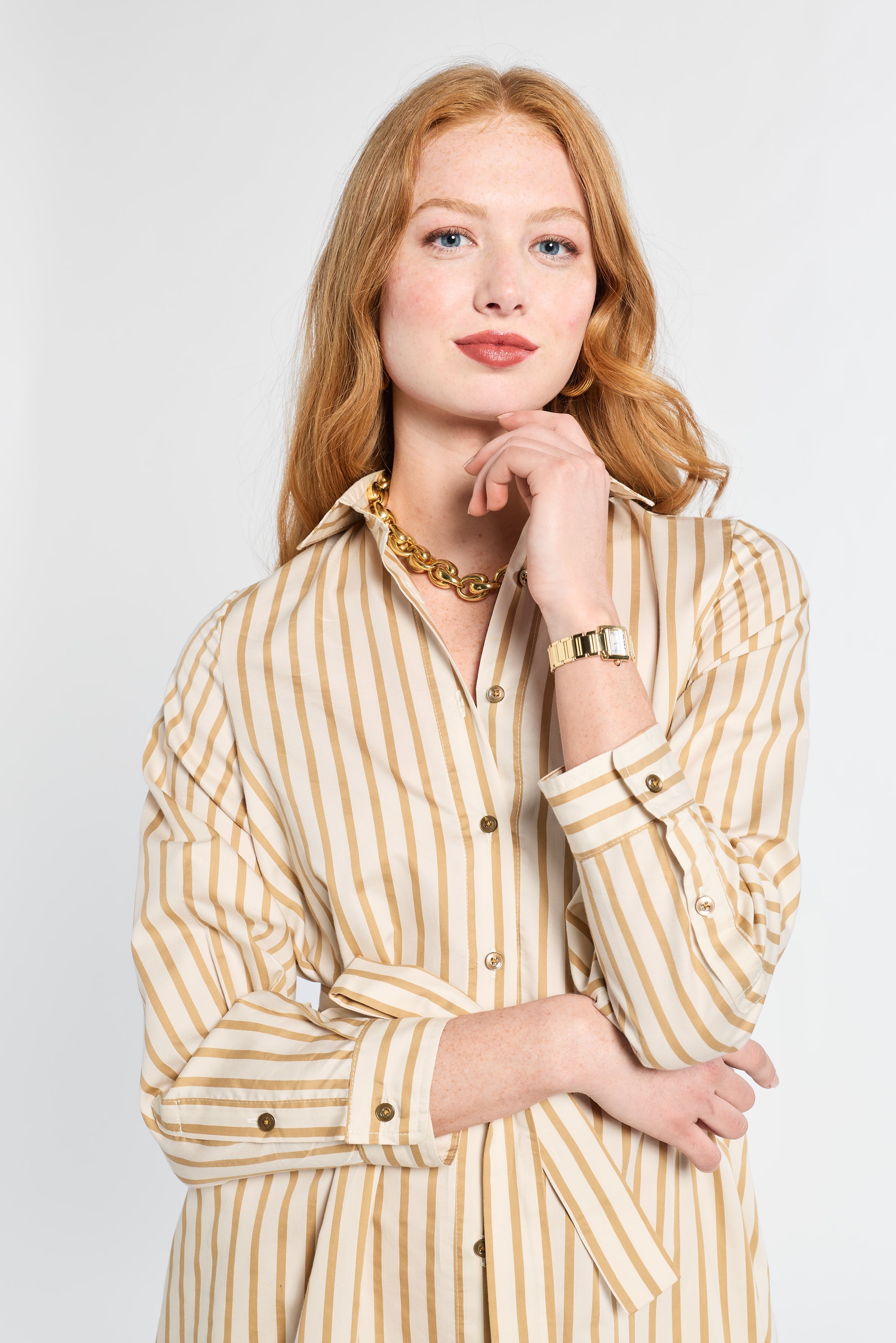 Close up of woman in striped dress 