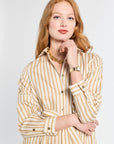 Close up of woman in striped dress 