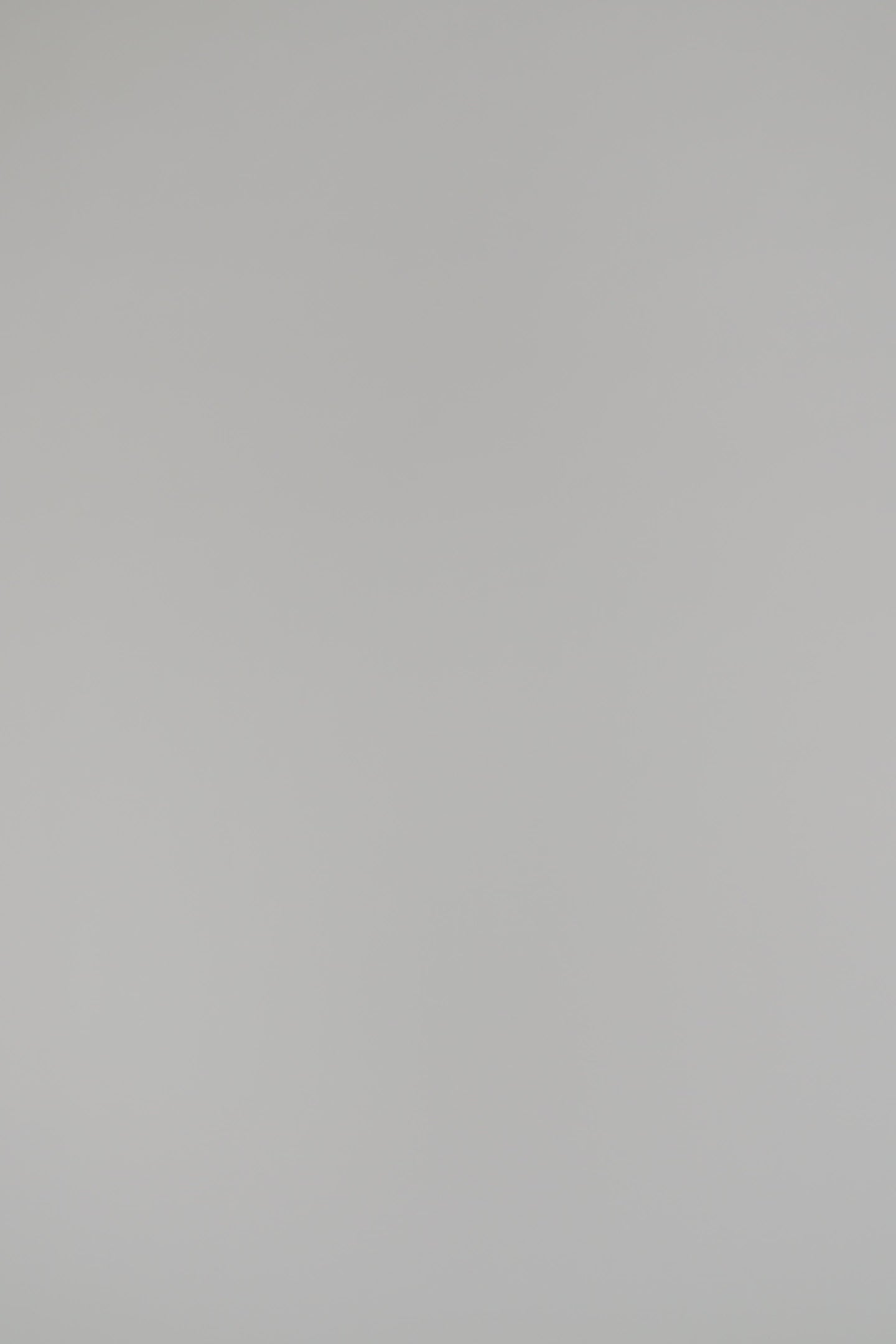 Woman wearing a black blouse on a white background