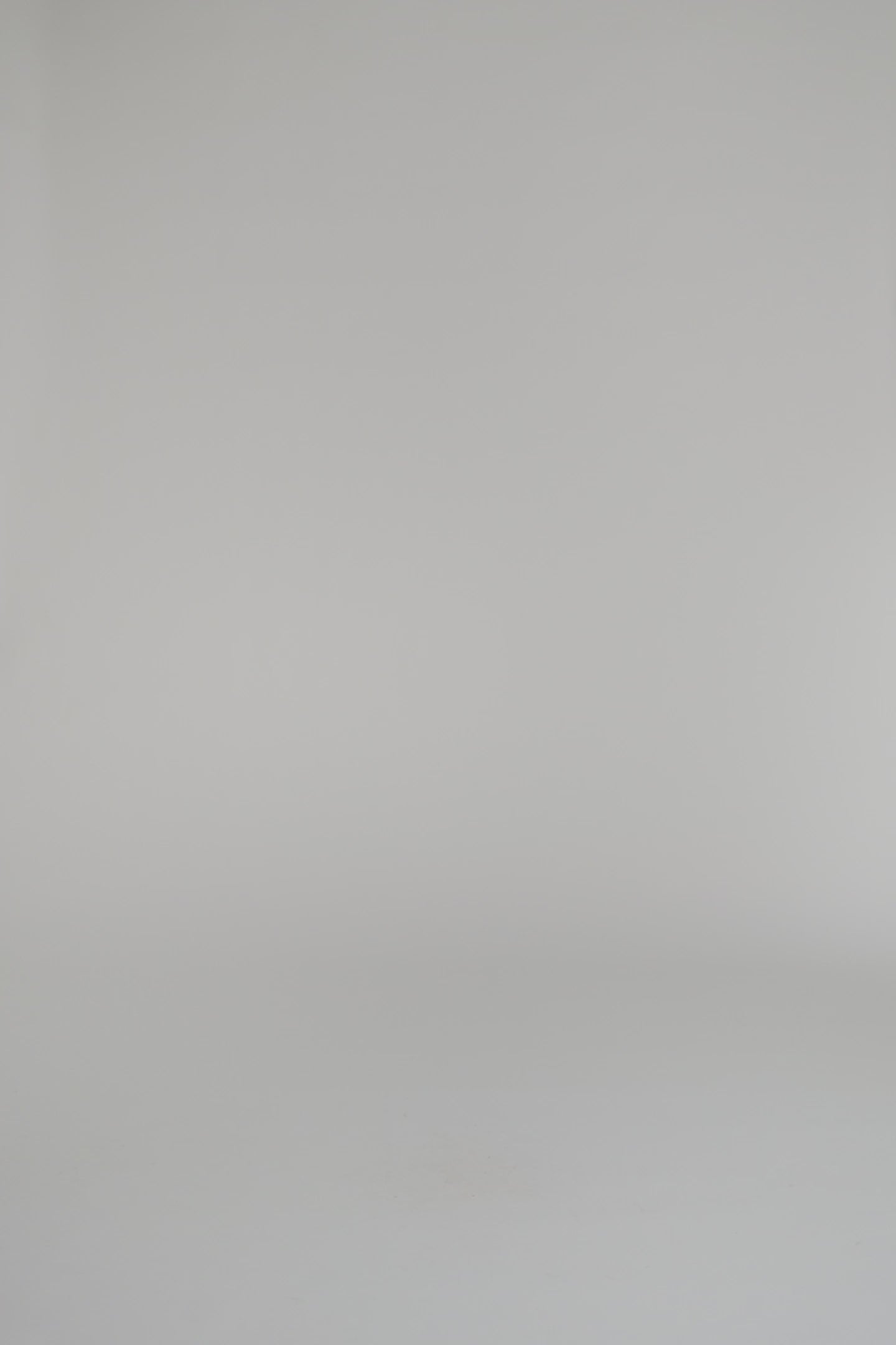 woman modeling black and white design outfit