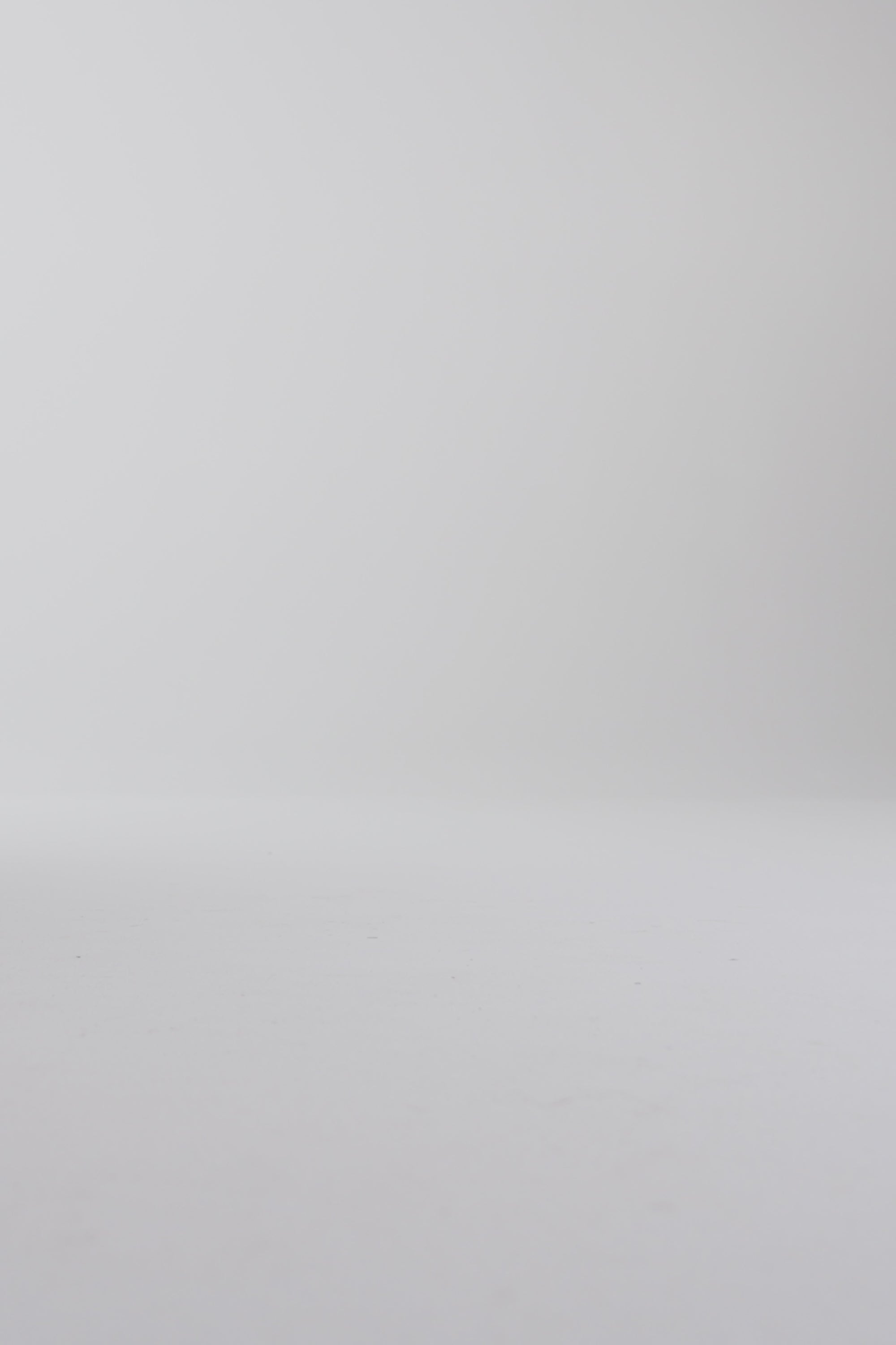Woman walking in brown oxford shoes on a white backdrop