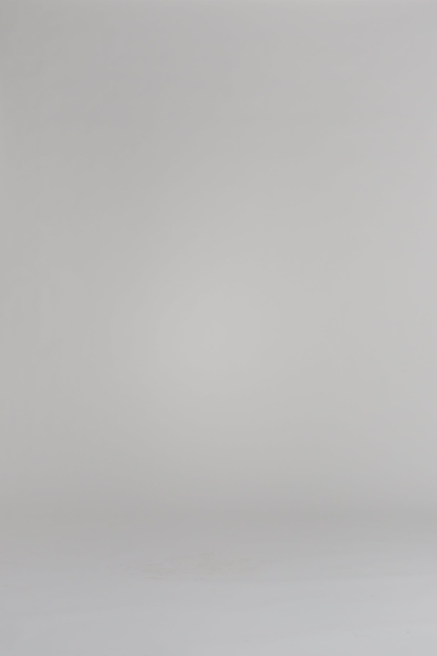 woman modeling a purple cardigan